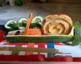 A picture of step 12 of Cucumber snail or chain...And flower salad.