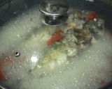 A picture of step 2 of Kinamatisang Alumahan (Striped Mackerel with Tomato).