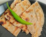 A picture of step 19 of Muttor paneer with laccha paratha.