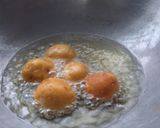 A picture of step 6 of Stuffed peanut chickpeas koftas in Spinach Curry.