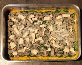 Foto del passaggio 12 della ricetta Lasagna di zucca delica funghi champignon spinaci e salsiccia