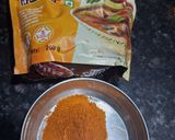 A picture of step 4 of Sambhar with idli.