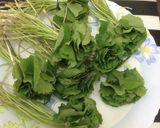 A picture of step 1 of Thankuni Pata Bora (Centella Leaves Fritters / Pakoras - Bengali Style).