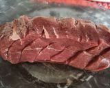 Foto del paso 1 de la receta Lomo de cerdo en salsa de papaya y naranja sobre cama de arroz