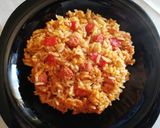 Foto del paso 5 de la receta Arroz con chistorras y piquillos al brandy