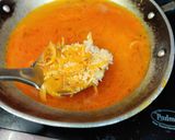 A picture of step 2 of Onion rice with tadka raita.