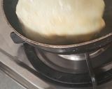 A picture of step 10 of Luchi and Cholar Dal.