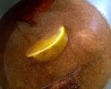 A picture of step 1 of Orange Spiced Simple Syrup.