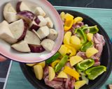 Foto del paso 11 de la receta Muslos de pollo con patatas en el pizzapan