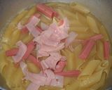 Foto del paso 5 de la receta: Fideos mostacholes con salchicha, huevo y jamón (One Pot Pasta)
