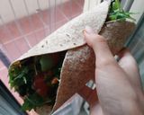 Foto del paso 4 de la receta: Wrap de rúcula mediterráneo