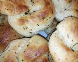 A picture of step 7 of Garlic and herbs knotted rolls.