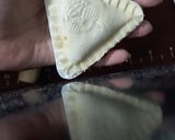 A picture of step 3 of Chicken samosa in different shapes.