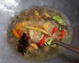 Foto langkah ke 3 dari resep Kepala Ikan Kuah Santan Bumbu Iris.