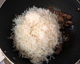 A picture of step 3 of Filipino Chicken Adobo Fried Rice.