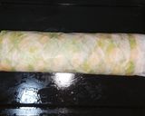 A picture of step 7 of Kiwi swiss roll cake.