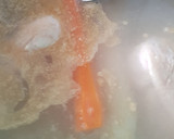 Foto del paso 4 de la receta: Caldo de pollo en olla rápida