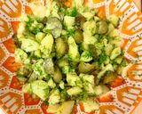 A picture of step 4 of Potato salad with pickled cucumbers and green peas.