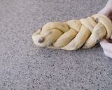 A picture of step 12 of Soft Chewy Braided Raisin Bread.