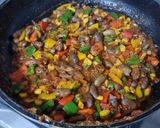 A picture of step 2 of Mexican rice pulao.