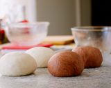 A picture of step 9 of Mini and Cute Cocoa Marble Bread | used two loaf pans.