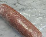 Foto del passaggio 2 della ricetta Polpettone con mortadella, tonno e provola avvolto in cicoria