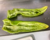 Une image de l'étape 7 de Poulet mariné aux poivrons tricolores et courgette.