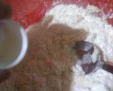 A picture of step 4 of Orange Marble Swiss Roll.