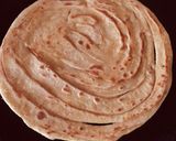 A picture of step 1 of Alu meethi with paratha.