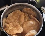 A picture of step 2 of Shreekhand with dryfruits and Pooris.