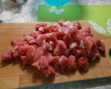 Sertéspörkölt rizzsel recept fázis 1 fotója
