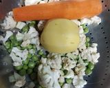A picture of step 1 of Carrot green peas mix sabji.
