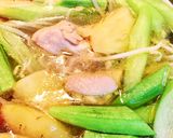 Hình bước làm 2 của món Canh Chua Nấu Với Cánh Gà