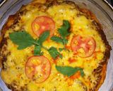 A picture of step 5 of Tandoori chicken pizza 🍕and steak and mushroom pizza 🍕.