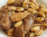 Foto del paso 18 de la receta: Cazuela de butifarra y calamarcitos con conchas