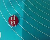 A picture of step 8 of Cricket 🏏 theme cake.