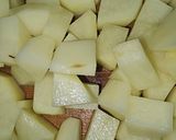 Foto del paso 4 de la receta: Ensalada tibia de calamar, langostinos, patatas y con emulsión de vinagreta de limón