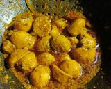 A picture of step 6 of Masala baby potatoes.