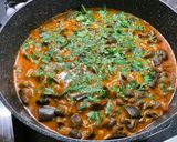 A picture of step 20 of Eggplant Curry with Mushrooms, Tomatoes, and Coconut Milk.