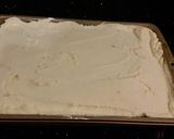 A picture of step 14 of Fresh Strawberry Chip Cake with Lemon Cream Frosting.