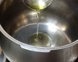 A picture of step 1 of Matar pulao.