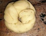 A picture of step 4 of Garlic and herbs knotted rolls.