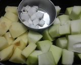 A picture of step 1 of Kaancha Peper Dalna Raw Papaya Curry.