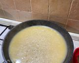 Foto del passaggio 1 della ricetta Risotto all’aglio nero e crema al parmigiano