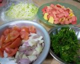 A picture of step 1 of Cabbage Carrots peas & potato vegetable.