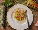 Foto del passaggio 4 della ricetta Pennette cremose con la robiola e prosciutto cotto croccanti gratinate in forno
