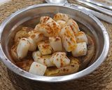 Foto del paso 5 de la receta: Pota al Vapor con Patatas en Nido