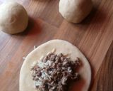 A picture of step 6 of Pirozhki (Meat Hand Pies).