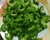A picture of step 1 of  bitter gourd curry.