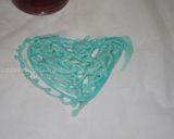 A picture of step 8 of Chocolate lace lollipops.